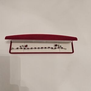 Elegant Silver and Red Gemstone Bracelet
